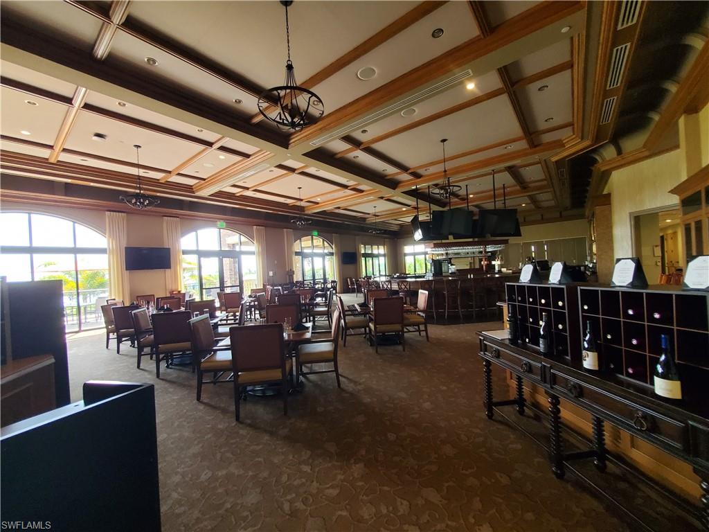 9596 Trevi Court, Unit 5428 Naples, FL 34113 - Photo 34 of 43 a view of a bar restaurant