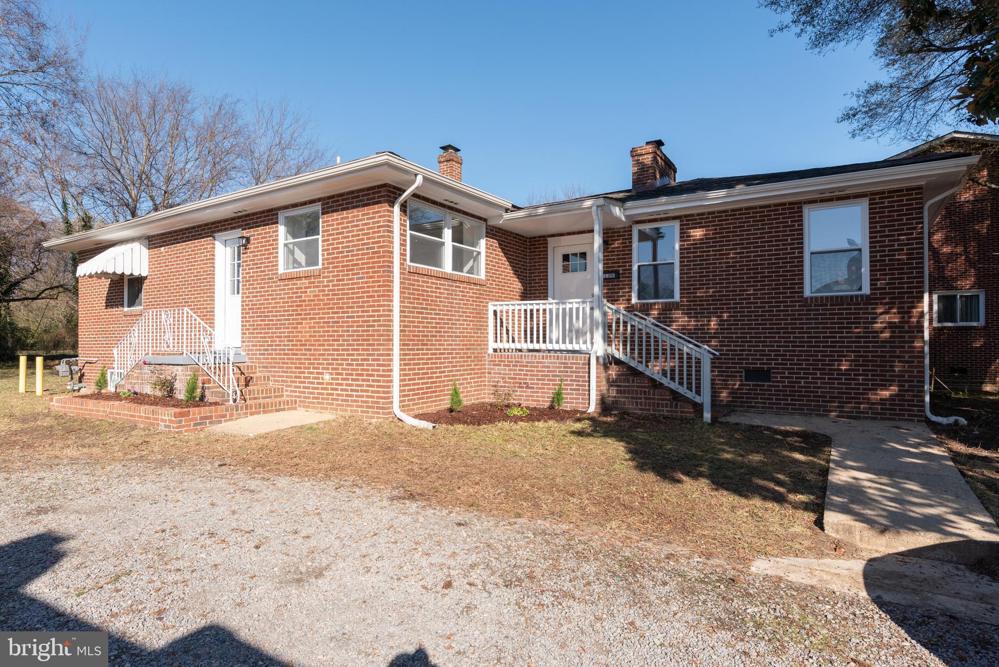 3306 East River Road Petersburg, VA 23803 - Photo 1 of 31 a front view of a house with a yard