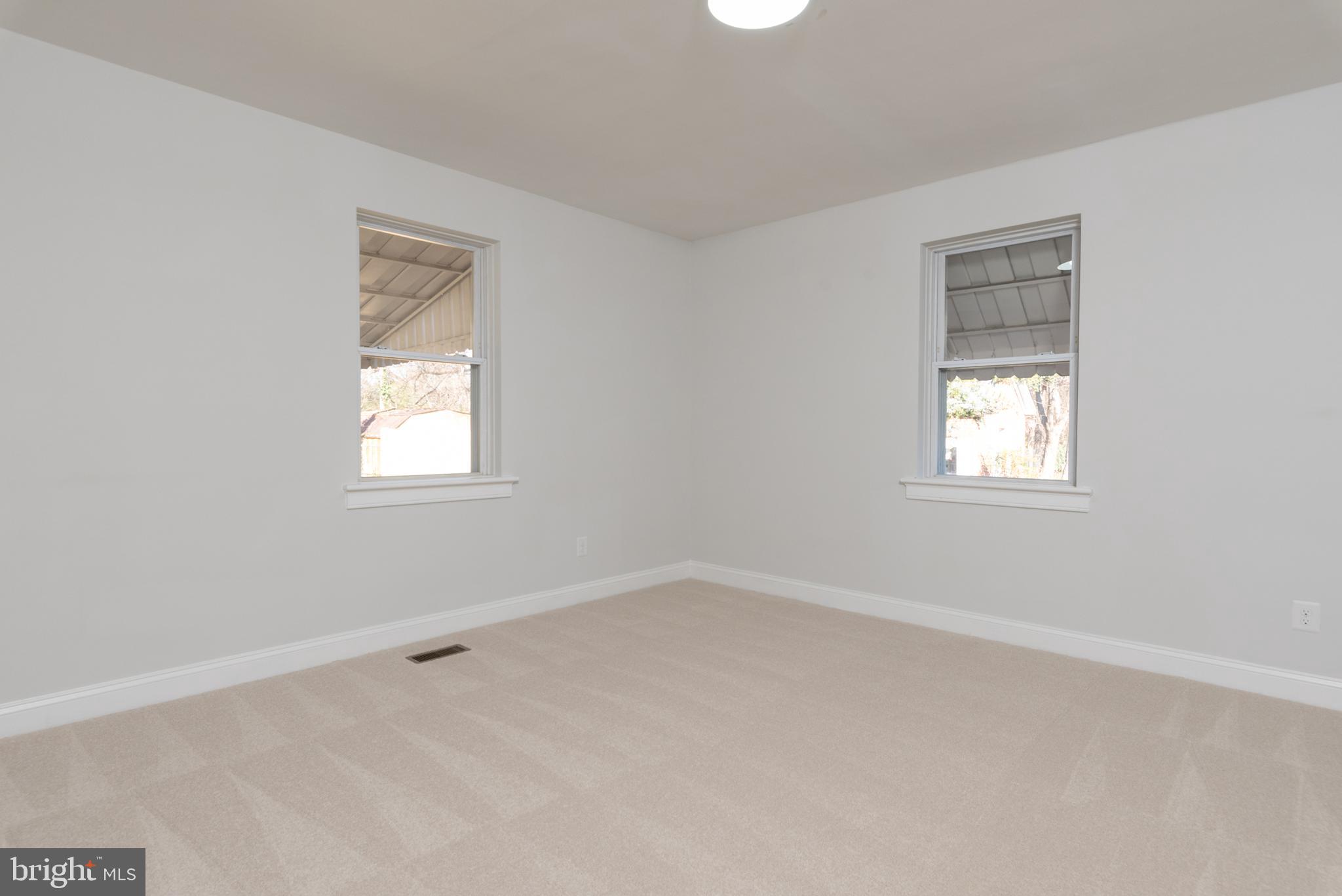 3306 East River Road Petersburg, VA 23803 - Photo 18 of 31 an empty room with windows