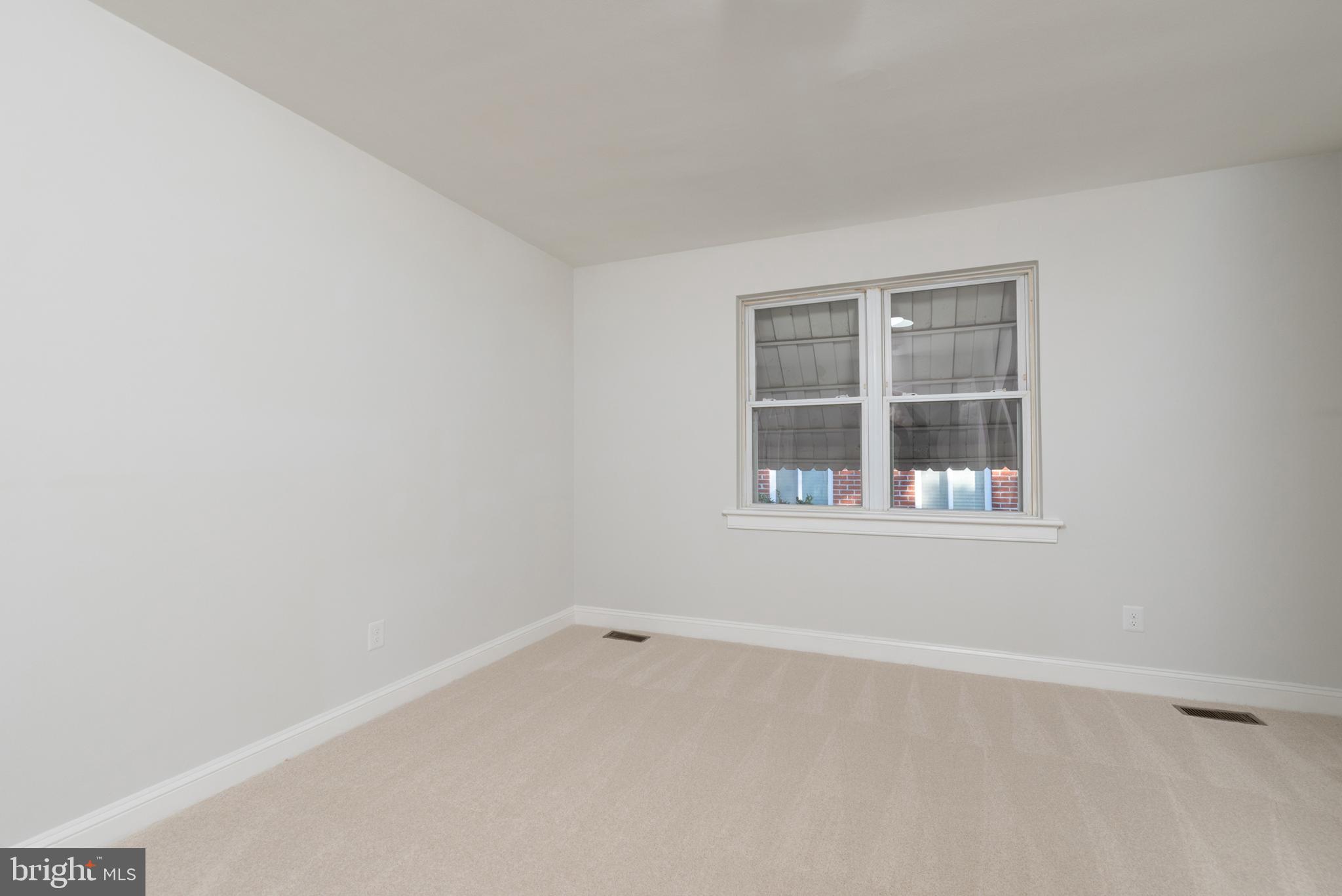 3306 East River Road Petersburg, VA 23803 - Photo 20 of 31 an empty room with a window