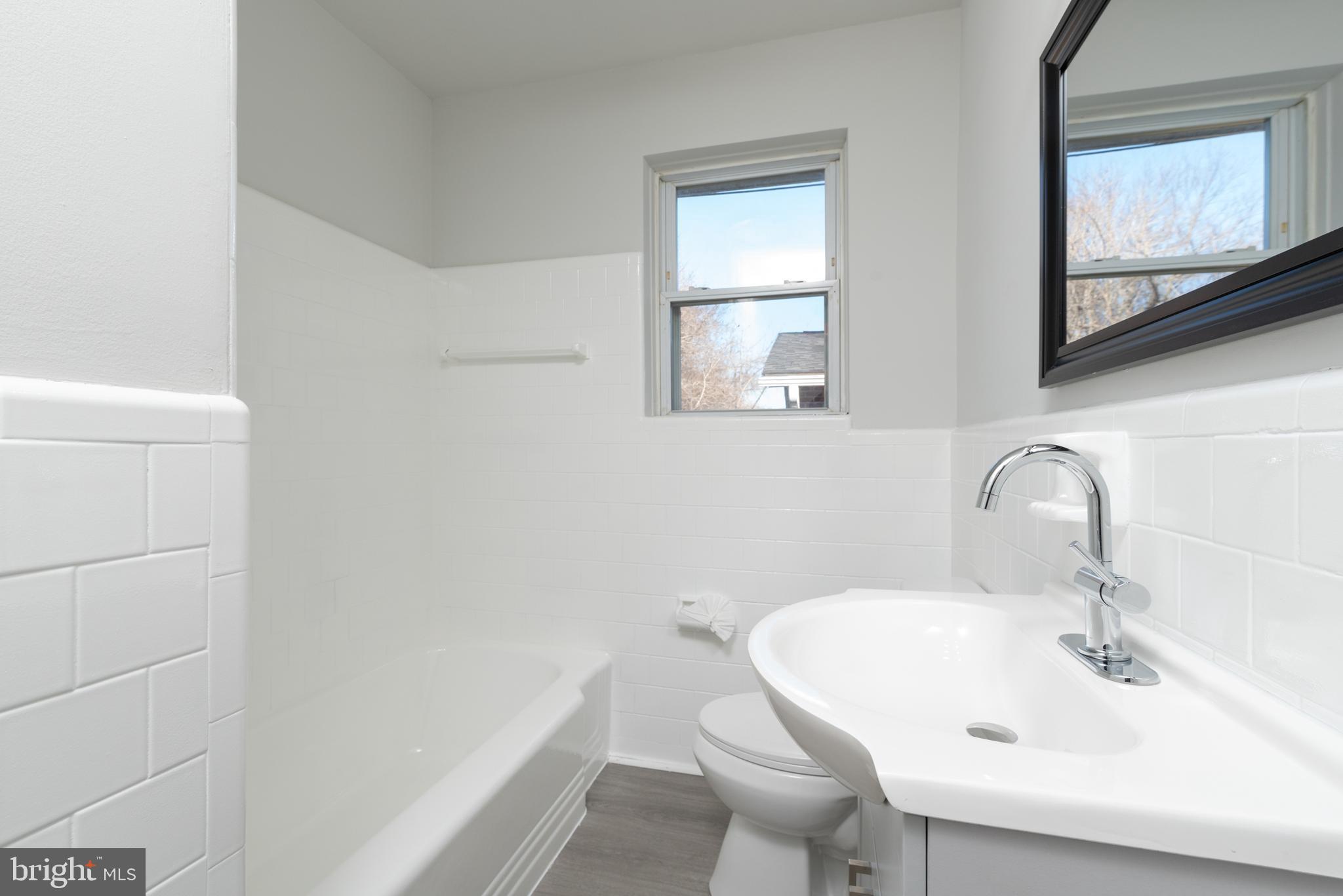 3306 East River Road Petersburg, VA 23803 - Photo 22 of 31 a bathroom with a sink and a toilet