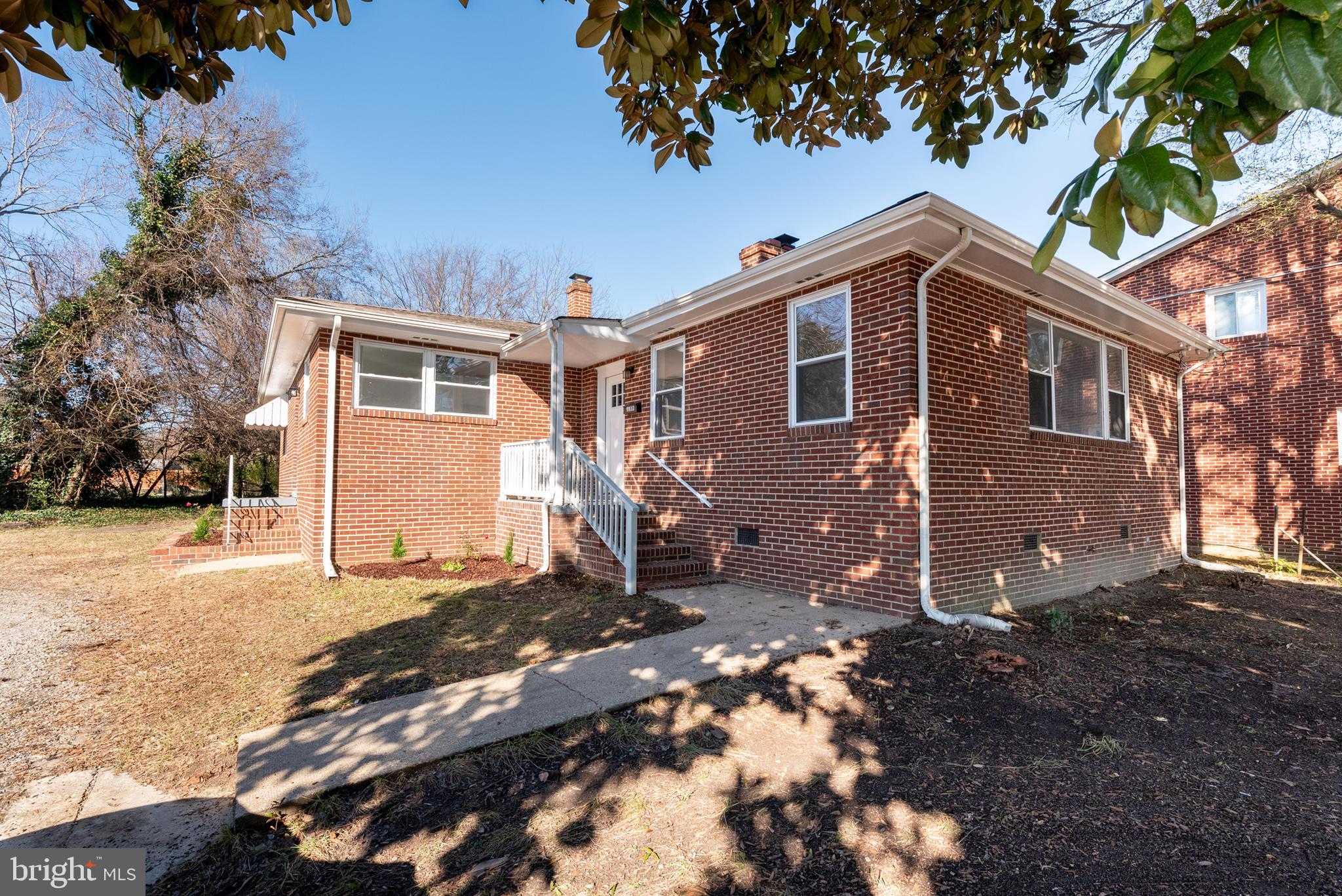 3306 East River Road Petersburg, VA 23803 - Photo 4 of 31 a view of a house with a yard