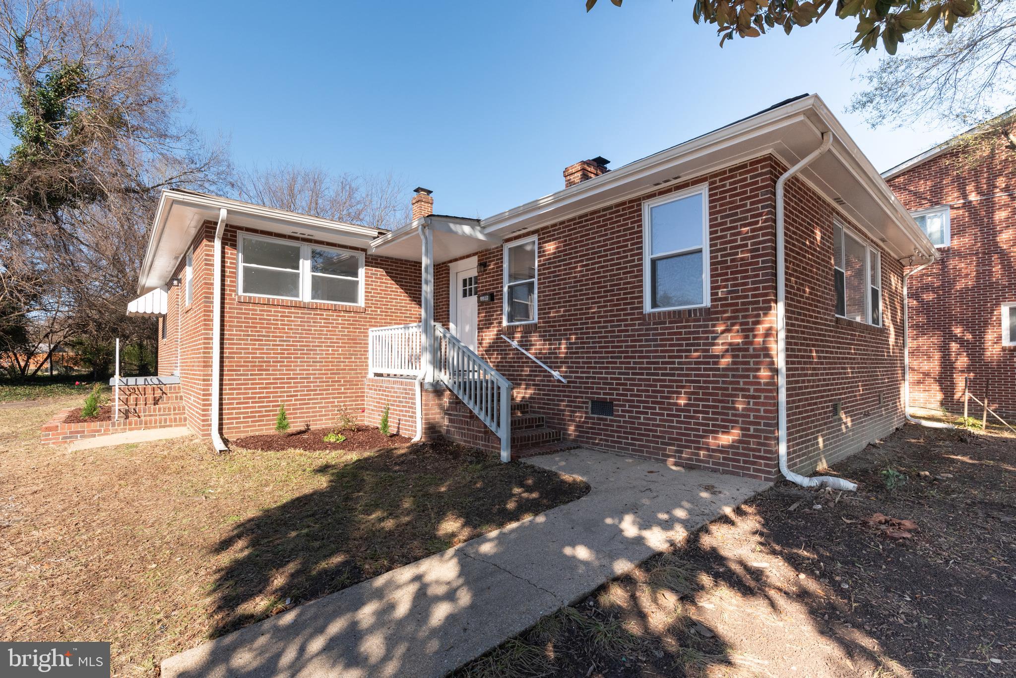 3306 East River Road Petersburg, VA 23803 - Photo 5 of 31 a front view of a house with a yard