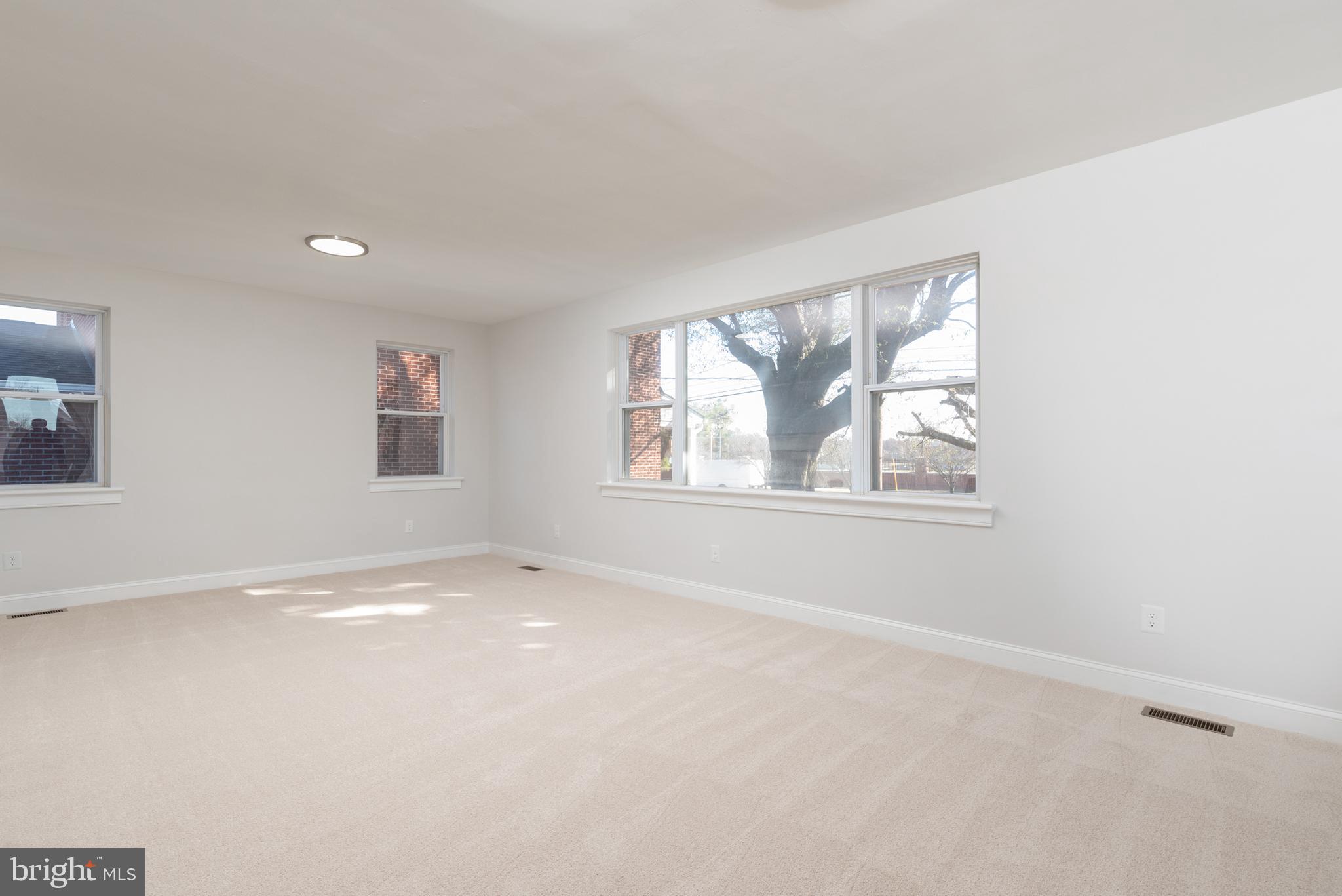 3306 East River Road Petersburg, VA 23803 - Photo 8 of 31 an empty room with windows