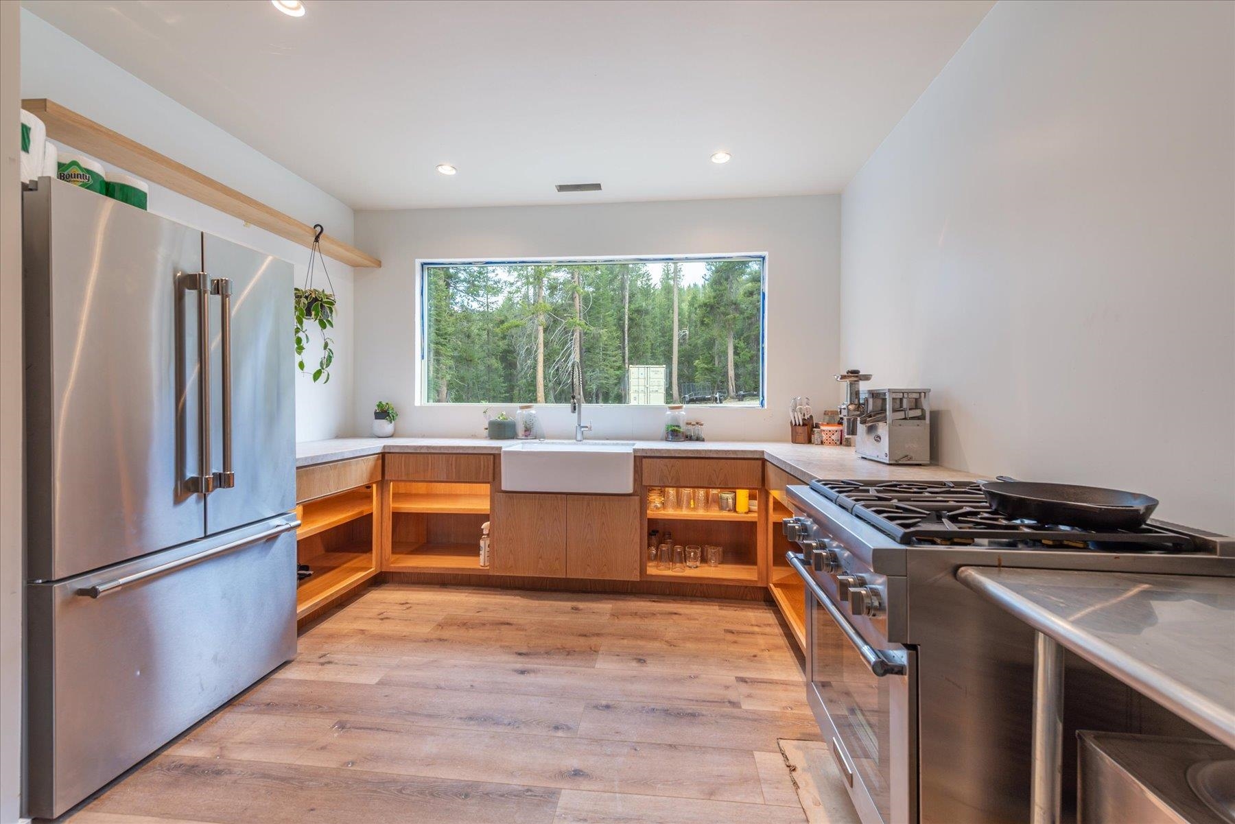 804 Fiberboard Road Sierraville, CA 96126 - Photo 23 of 28 a kitchen with stainless steel appliances a stove a sink a refrigerator and a stove