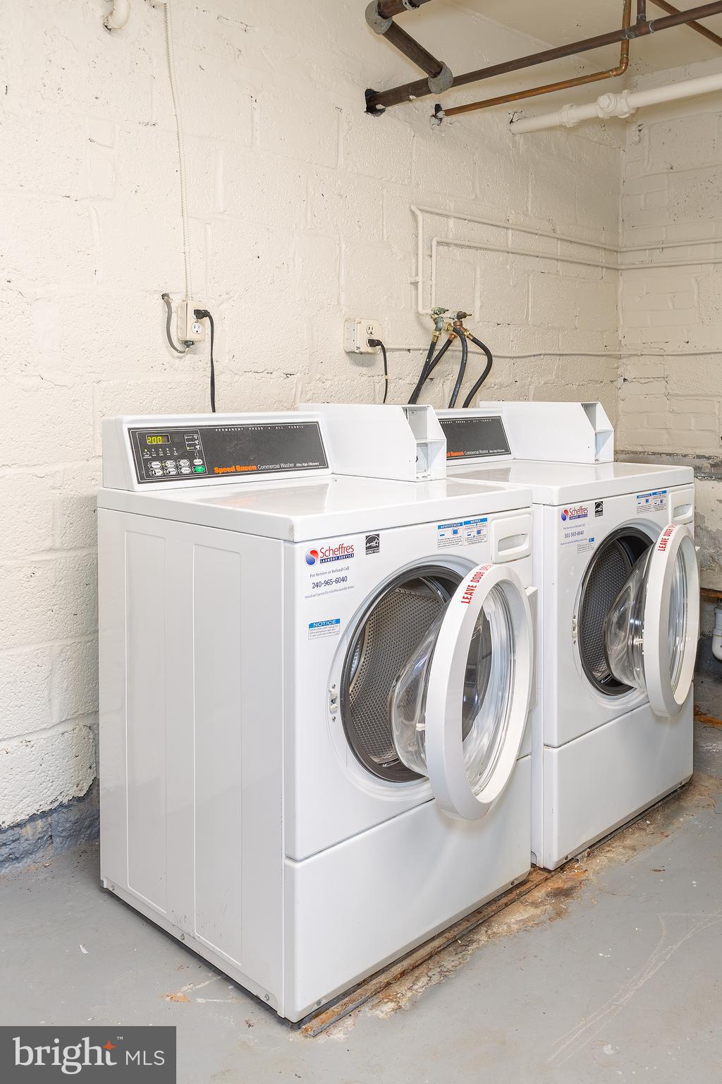 2415 Ontario Road Northwest, Unit 101 Washington, DC 20009 - Photo 22 of 22 a utility room with dryer and washer
