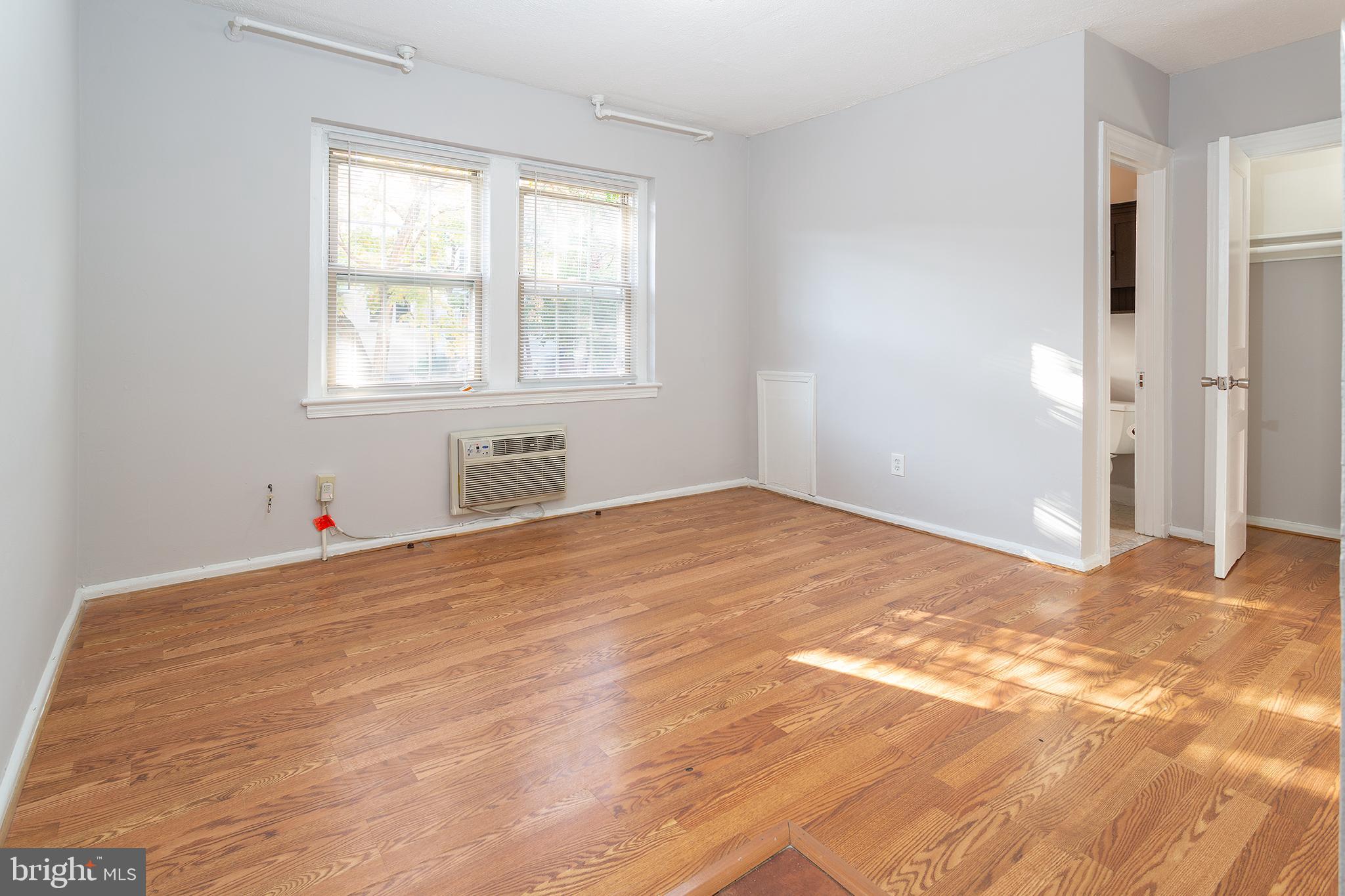 2415 Ontario Road Northwest, Unit 101 Washington, DC 20009 - Photo 4 of 22 a view of a room with a window