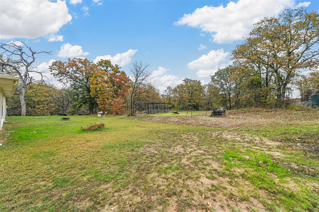 226 County Road 4869 Azle, TX 76020 - Photo 15 of 28 a view of a green field