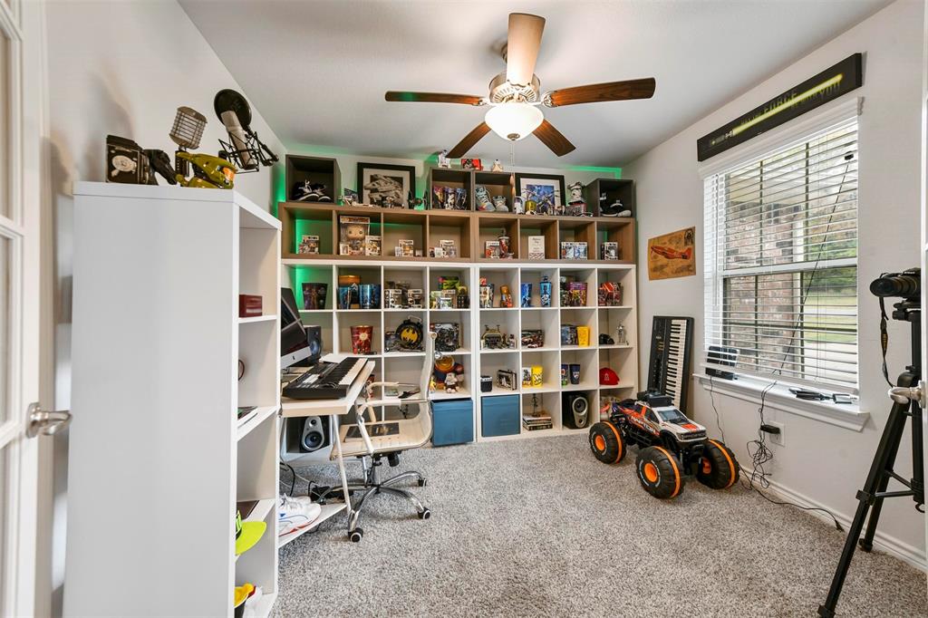 226 County Road 4869 Azle, TX 76020 - Photo 5 of 28 a view of a room with gym equipment