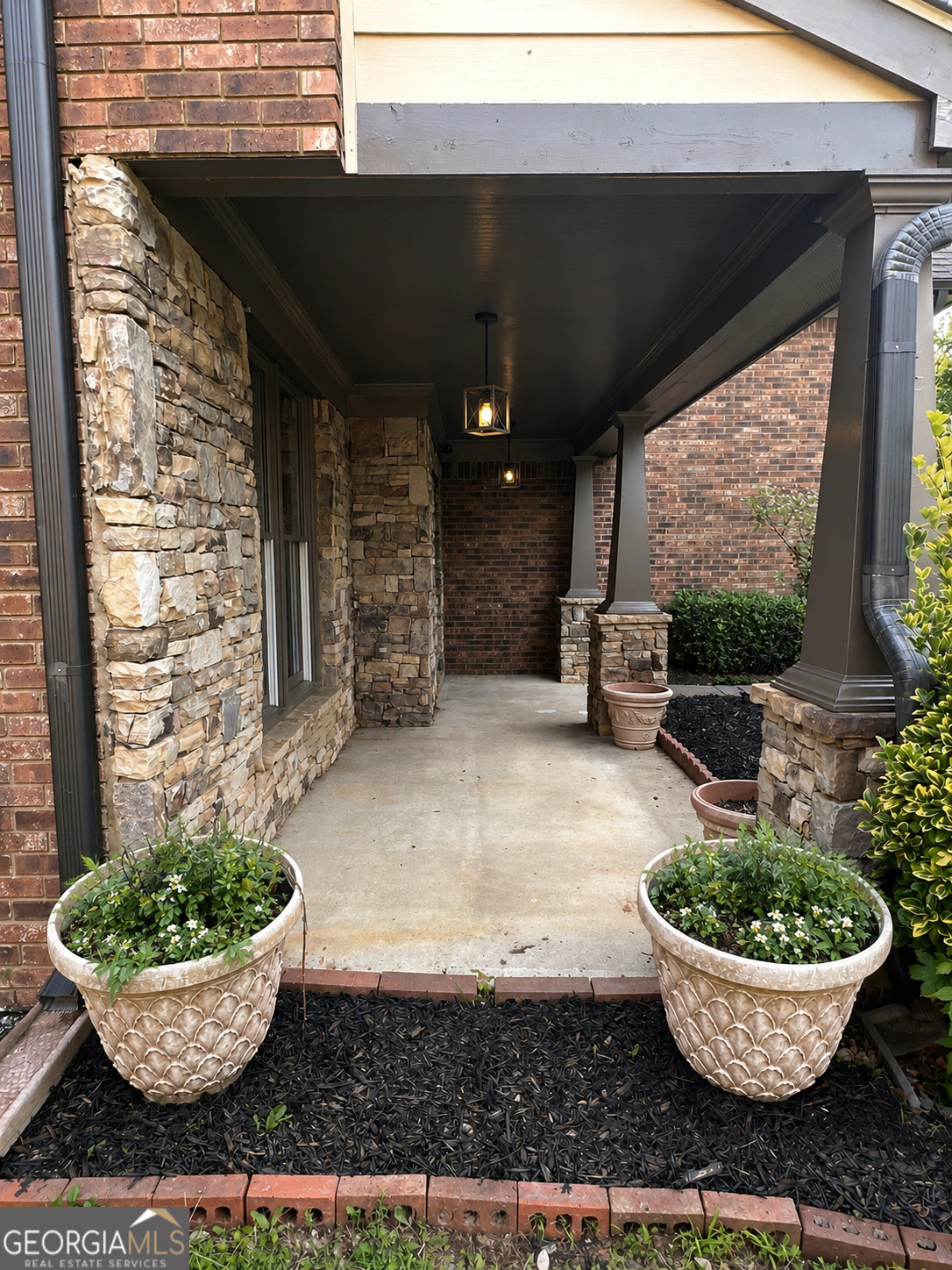 2614 Dolostone Way Dacula, GA 30019 - Photo 7 of 29 a view of a backyard with plants and dining area