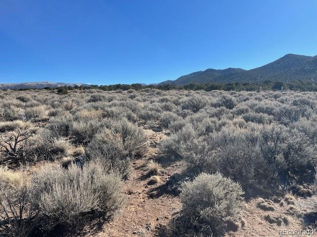 Lot 1188 Fleck Road Fort Garland, CO 81133 - Photo 11 of 14 a view of a large mountain with a mountain in the background