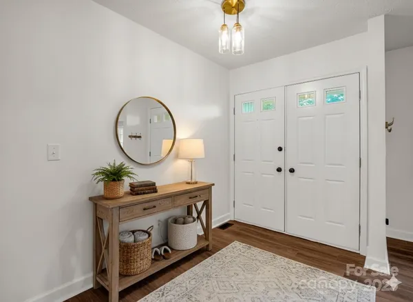 a very nice looking room with a wooden floor