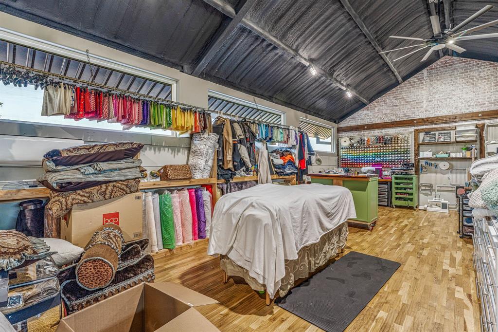 886 Mitchell Hill Road Gordon, TX 76453 - Photo 6 of 34 a bed room with a bed and a walk in closet