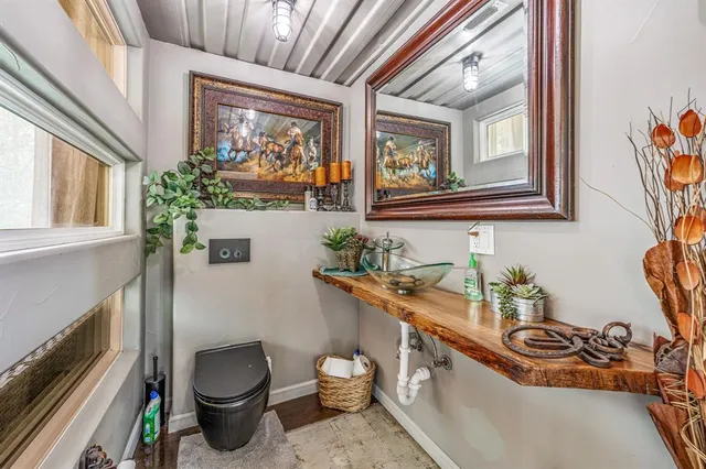 a view of a storage and utility room with washer and dryer