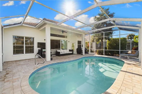 a view of a house with swimming pool