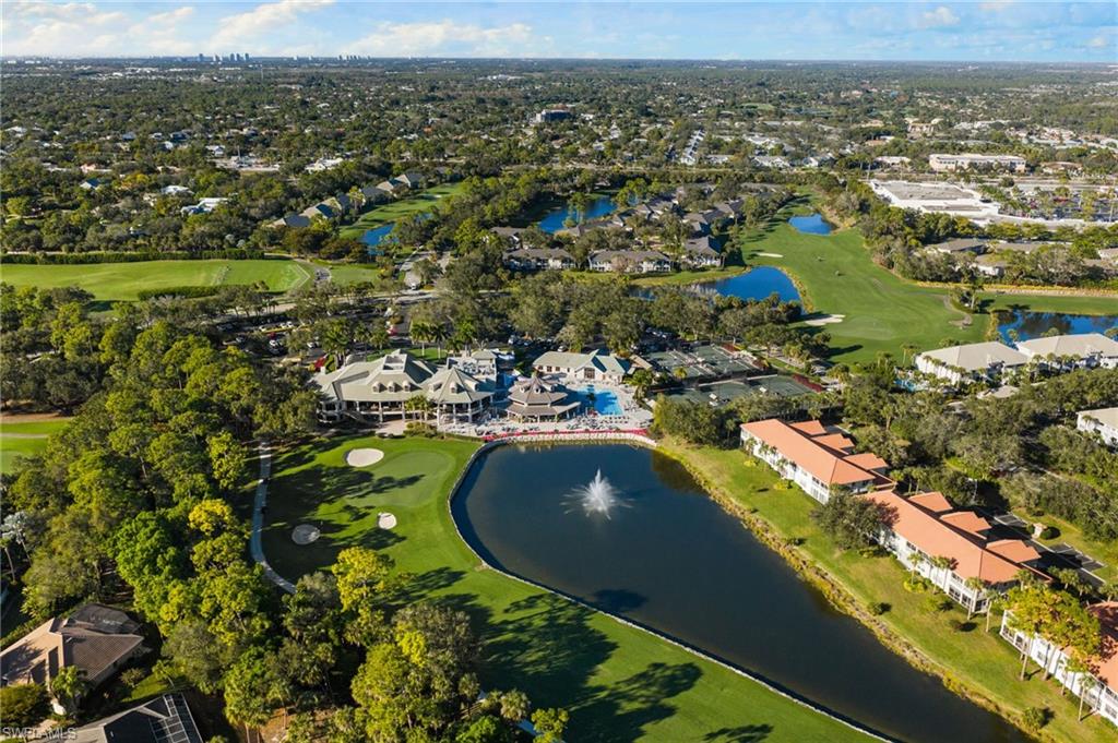 1869 Pondside Lane Naples, FL 34109 - Photo 33 of 34 Aerial view of residential area featuring a local golf course and a large body of water