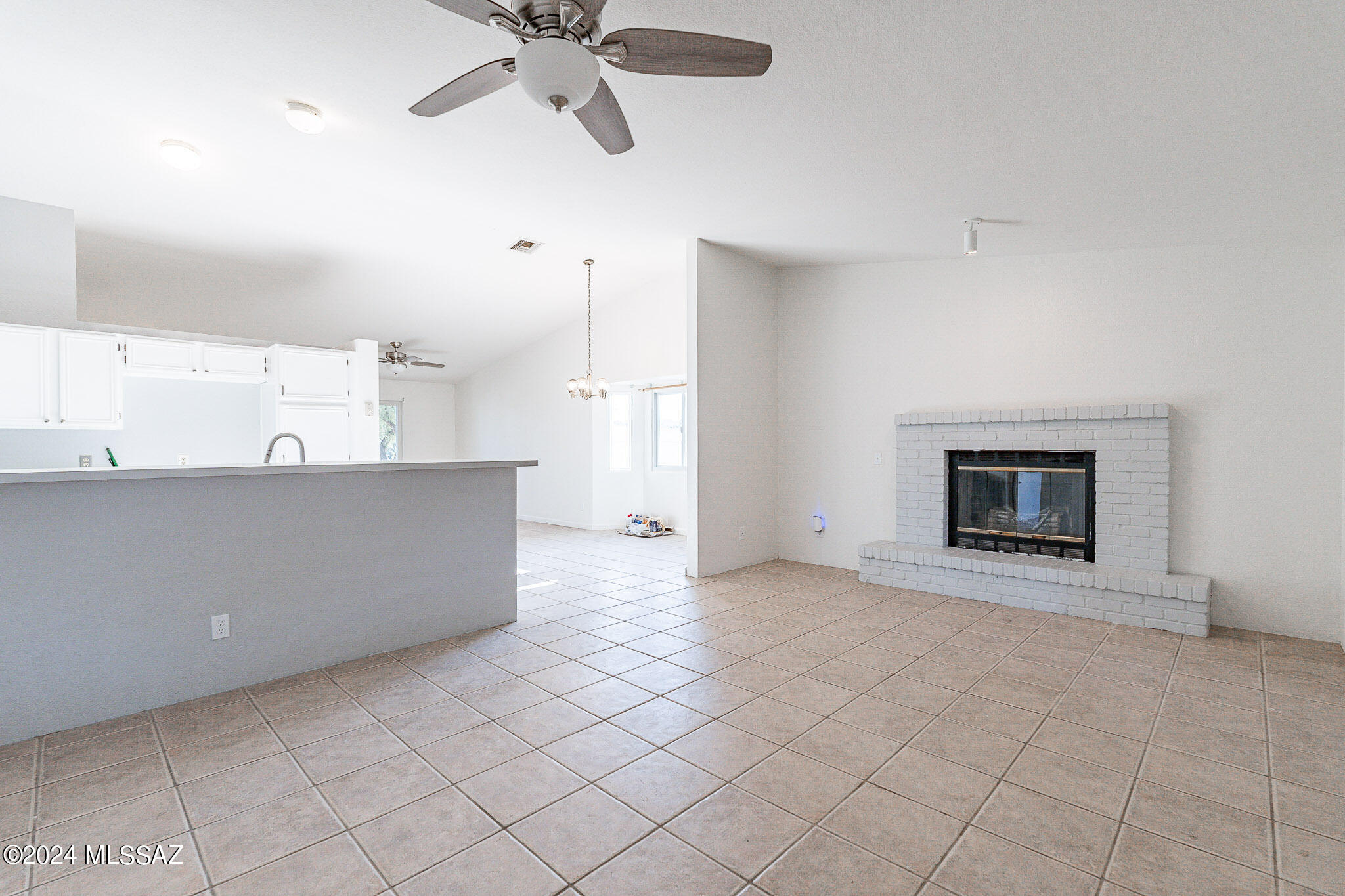 2690 West Sunset Road Tucson, AZ 85741 - Photo 9 of 33 a view of a livingroom with a fireplace