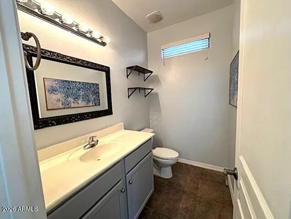 a view of a livingroom from a hallway