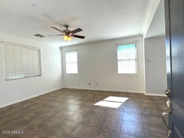 a kitchen with a sink and a microwave