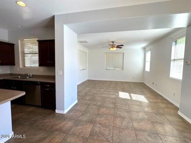 3827 East Trigger Way Gilbert, AZ 85297 - Photo 8 of 41 a view of a kitchen with a sink and a window