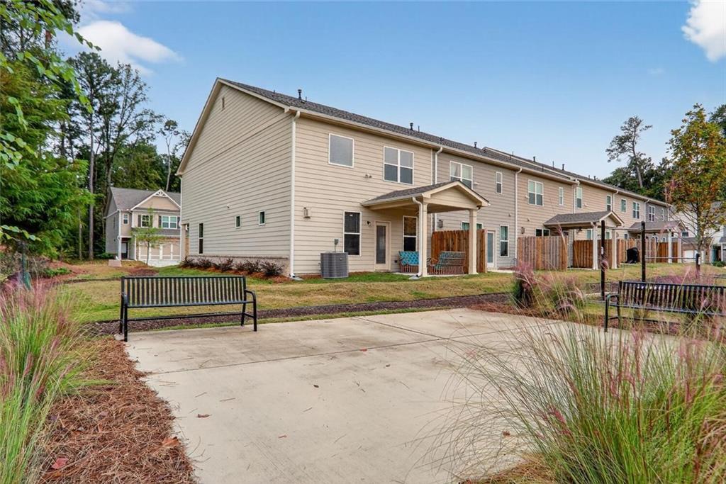 2805 Harmony Trail Road Atlanta, GA 30360 - Photo 22 of 23 a view of house with swimming pool and sitting area