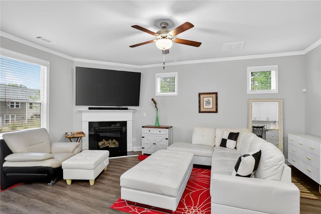 2805 Harmony Trail Road Atlanta, GA 30360 - Photo 8 of 23 a living room with furniture fireplace and a flat screen tv