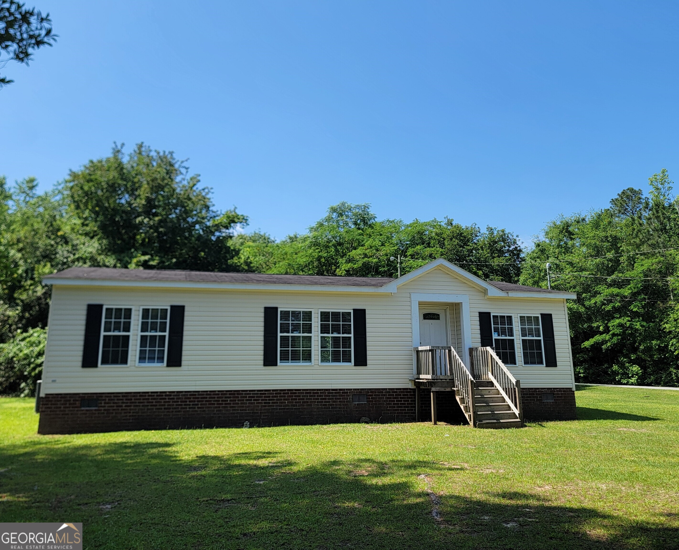 a view of a house with a patio
