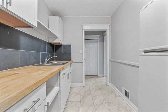 $378,000 | 3919-3921 Norledge Avenue, Kansas City, MO 64123