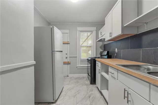 $378,000 | 3919-3921 Norledge Avenue, Kansas City, MO 64123