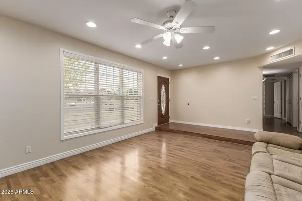 a view of an empty room with a window