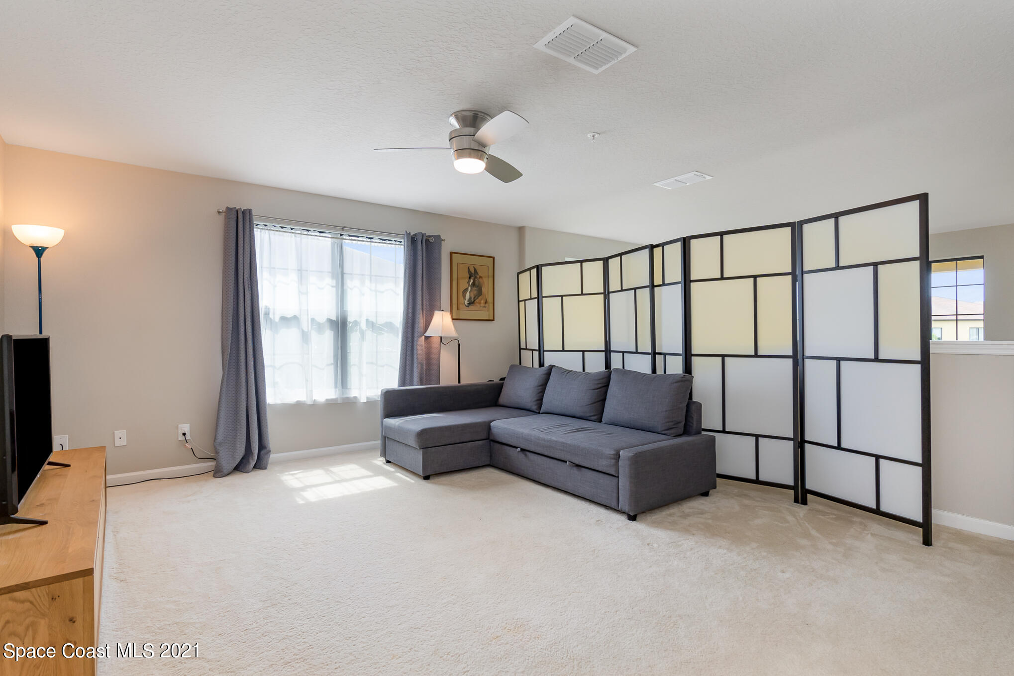 1420 Lara Circle, Unit 101 Rockledge, FL 32955 - Photo 12 of 28 Loft Living area