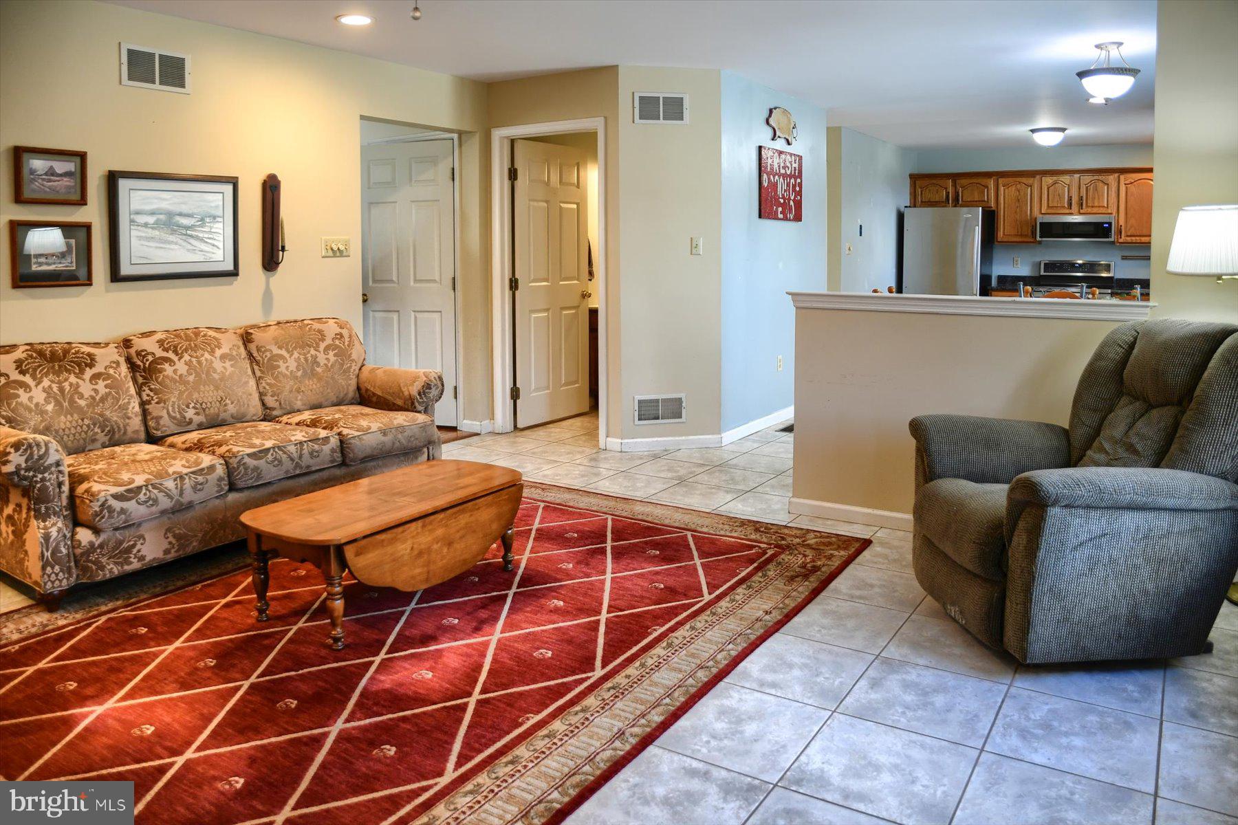 403 Chestnut Tree Road Elverson, PA 19520 - Photo 6 of 36 Family Room towards Kitchen
