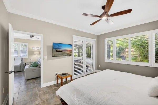 a spacious bathroom with a granite countertop tub sink and mirror