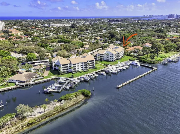 aerial view of a house with swimming pool and sitting area