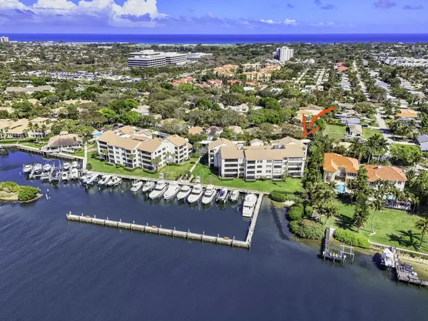 a view of a patio with a table and chairs