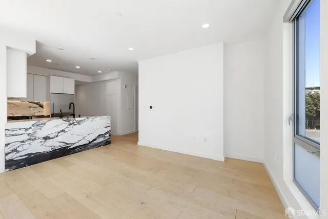 en empty room with windows