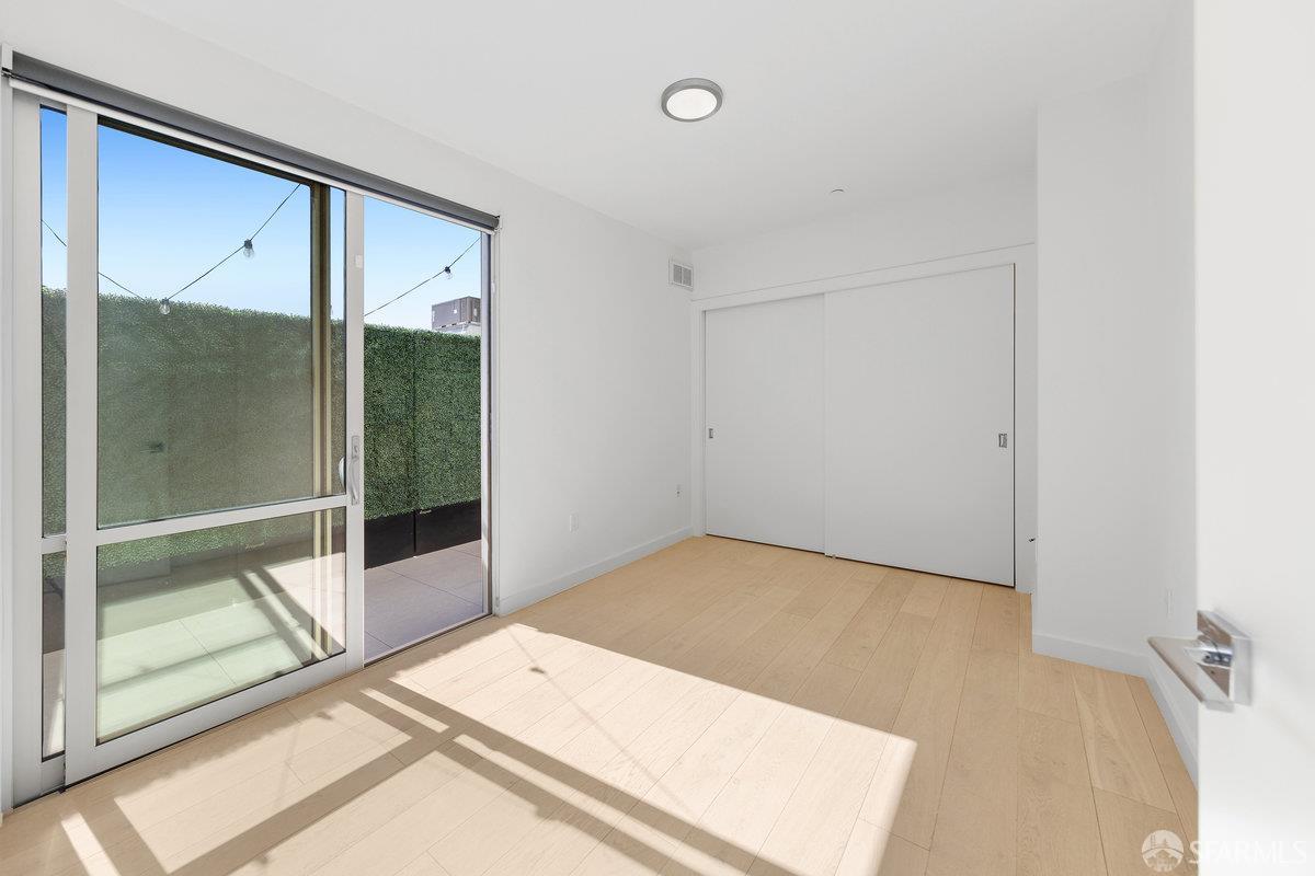 1 Stanyan Street, Unit 24 San Francisco, CA 94118 - Photo 20 of 51 a view of a room with a sliding door