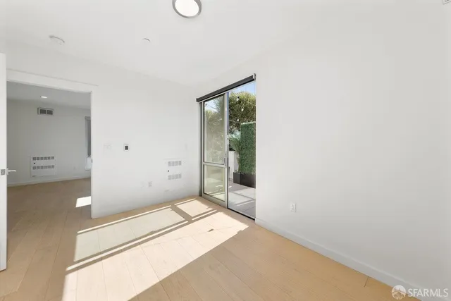 a large kitchen with kitchen island sink stove and refrigerator
