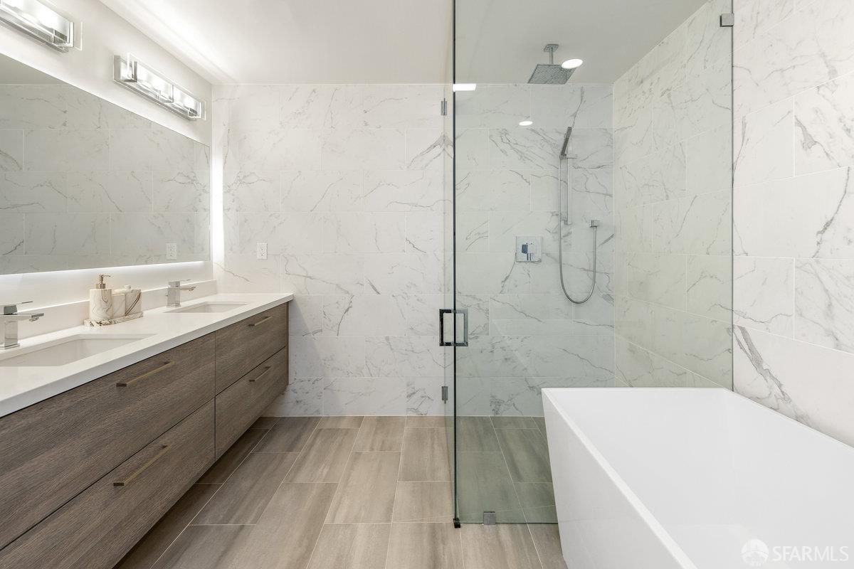 1 Stanyan Street, Unit 24 San Francisco, CA 94118 - Photo 36 of 51 a bathroom with a sink a toilet and shower