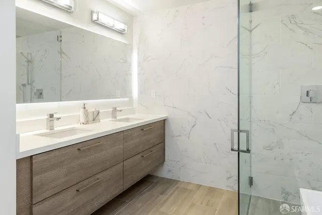 a view of a washer and dryer in a utility room