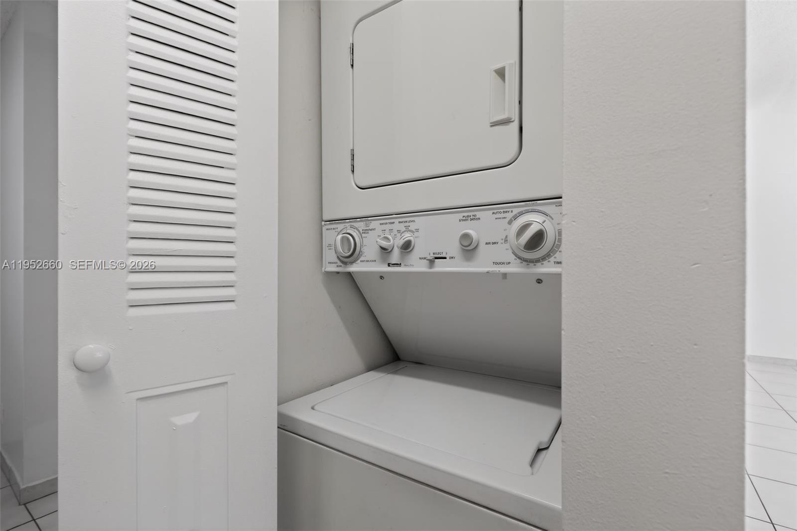13856 Southwest 93rd Lane, Unit 13856 Miami, FL 33186 - Photo 20 of 37 a utility room with dryer and washer