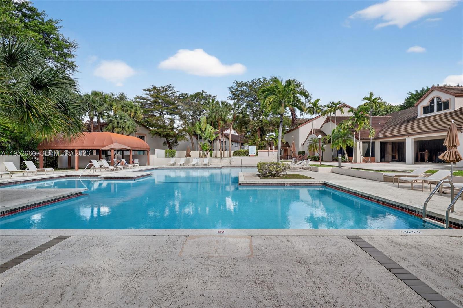 13856 Southwest 93rd Lane, Unit 13856 Miami, FL 33186 - Photo 2 of 37 a view of a house with swimming pool