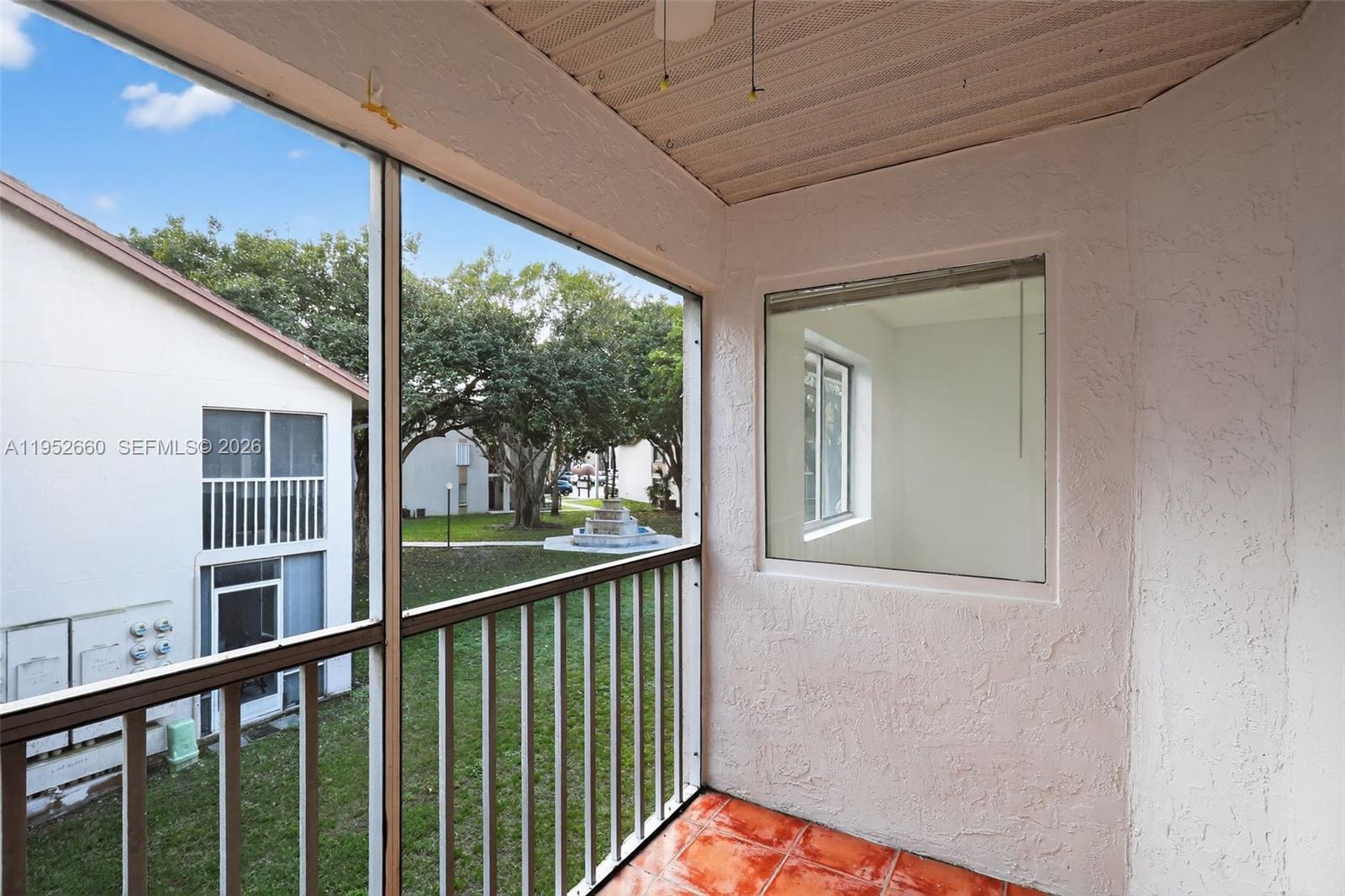 13856 Southwest 93rd Lane, Unit 13856 Miami, FL 33186 - Photo 29 of 37 a view of a balcony with an outdoor space