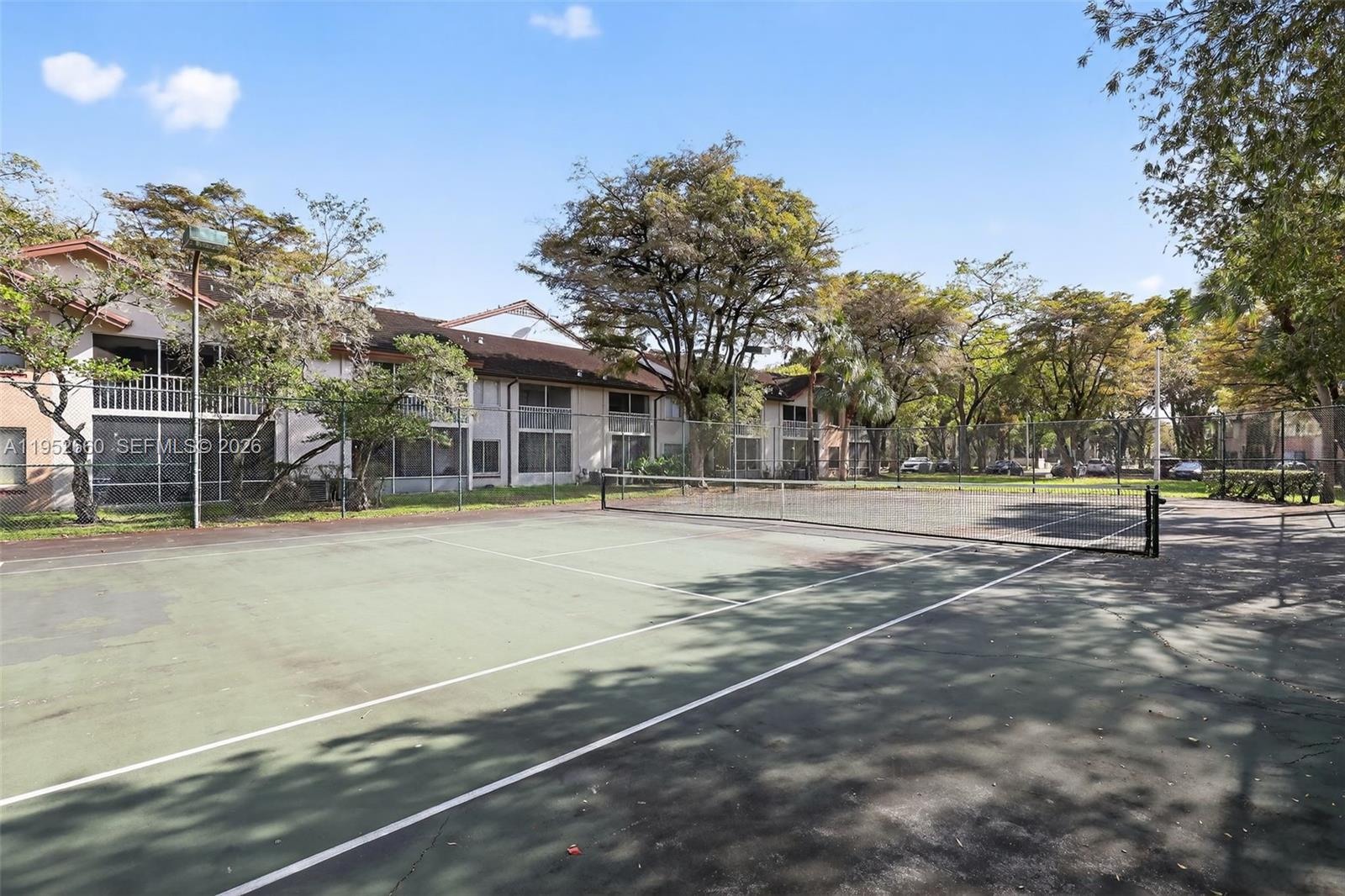 13856 Southwest 93rd Lane, Unit 13856 Miami, FL 33186 - Photo 33 of 37 a view of a playground with basketball court