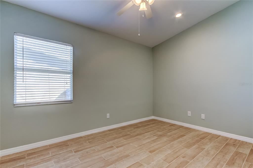 3936 East Eden Roc Circle Tampa, FL 33634 - Photo 42 of 68 an empty room with a window