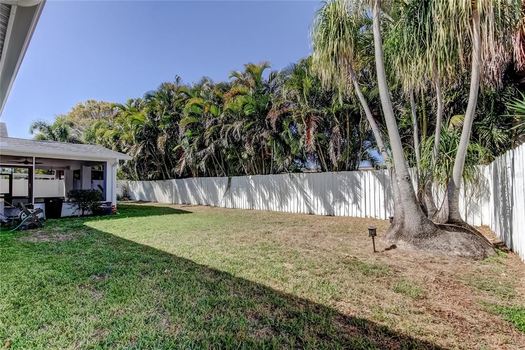 3936 East Eden Roc Circle Tampa, FL 33634 - Photo 61 of 68 a view of a house with backyard and sitting area