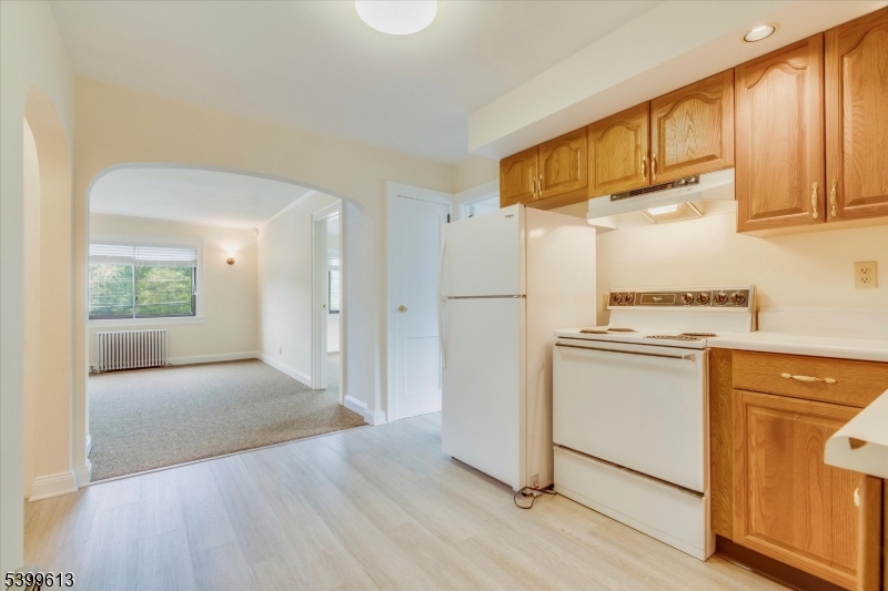 52 Hampton House Road Newton, NJ 07860 - Photo 2 of 22 a kitchen with stainless steel appliances granite countertop a refrigerator and a stove top oven