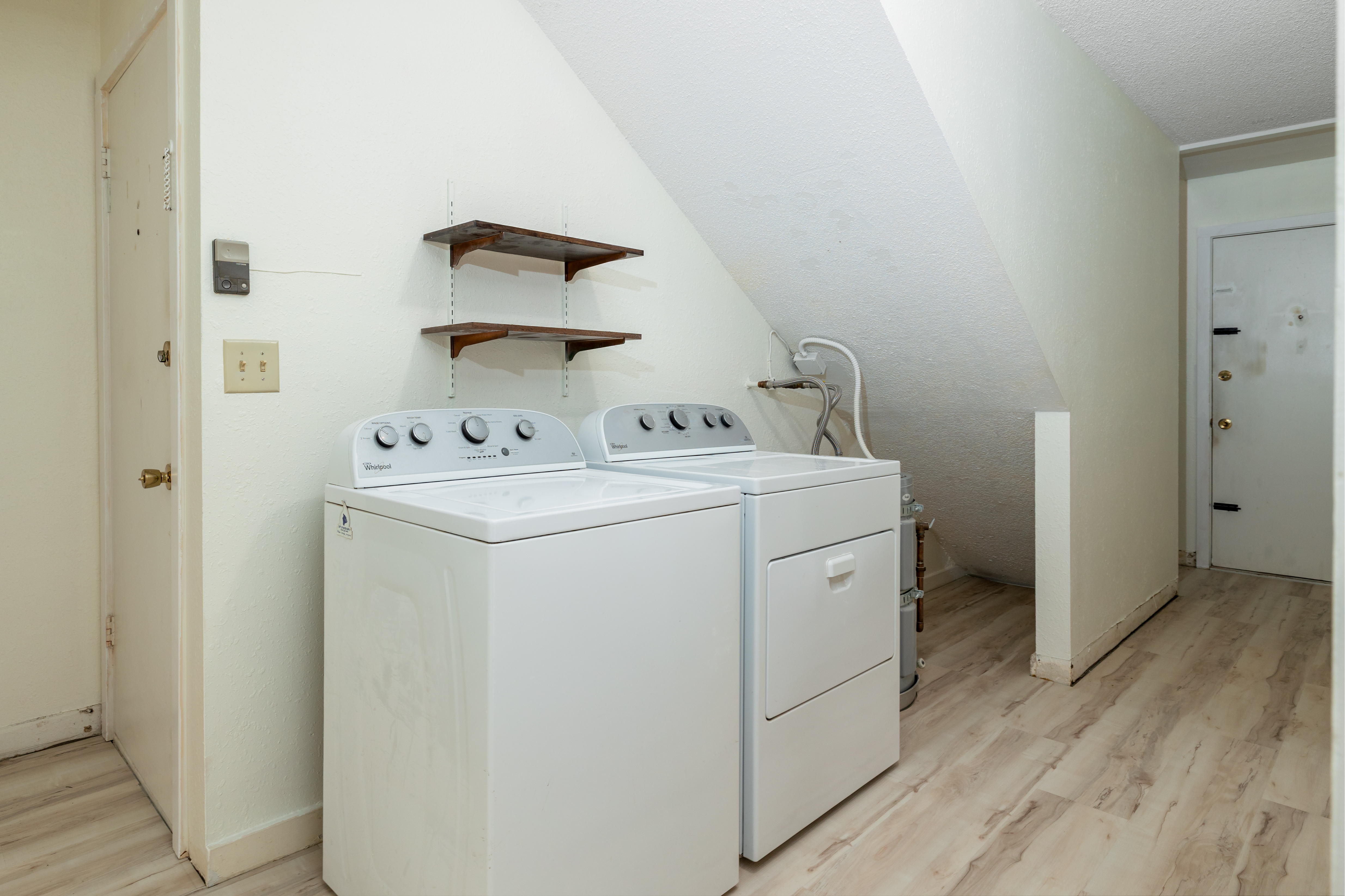 75-185-b Alakai Street, Unit B Kailua-Kona, HI 96740 - Photo 11 of 27 a utility room with dryer and washer