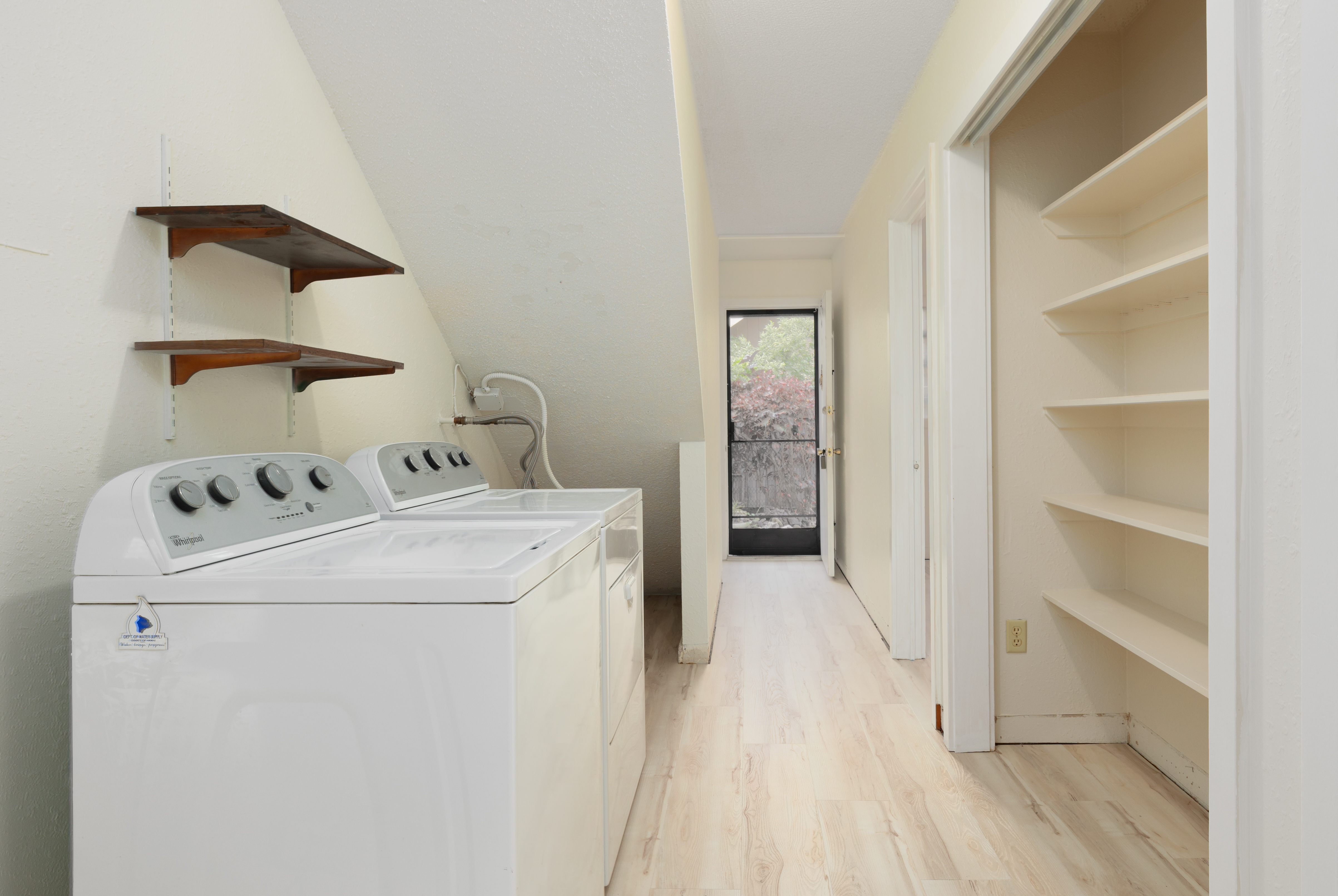 75-185-b Alakai Street, Unit B Kailua-Kona, HI 96740 - Photo 12 of 27 a utility room with dryer and washer