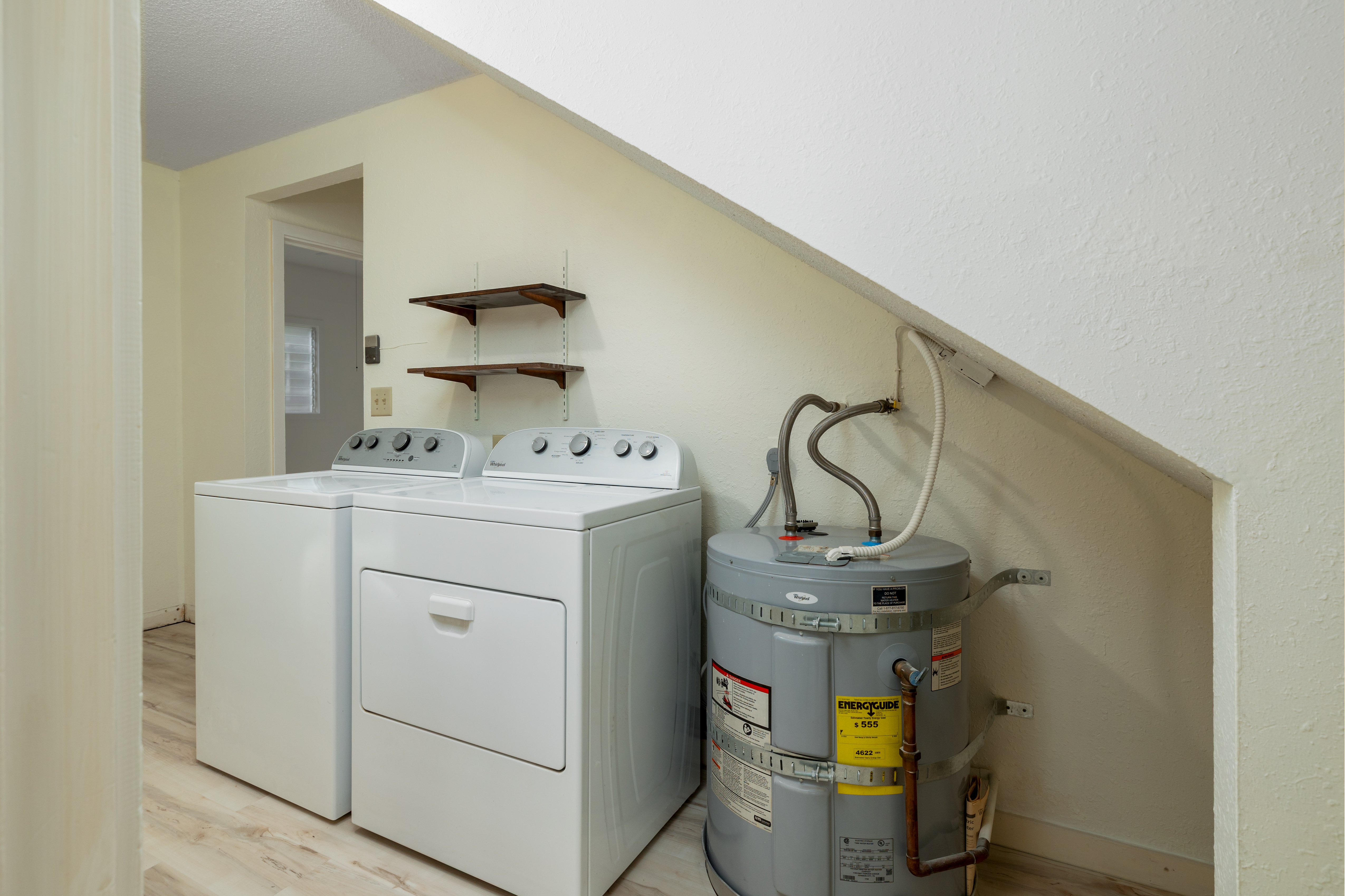 75-185-b Alakai Street, Unit B Kailua-Kona, HI 96740 - Photo 13 of 27 a utility room with dryer and washer